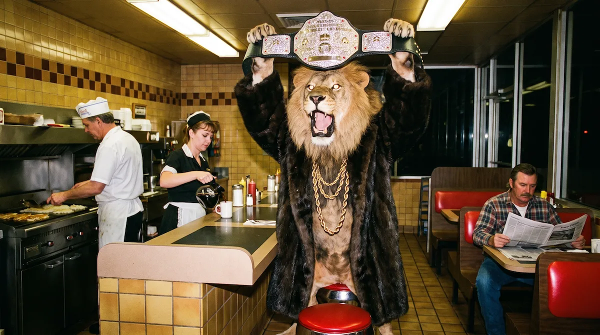 A lion in a mink coat holding a championship belt overhead in a diner while nobody looks
